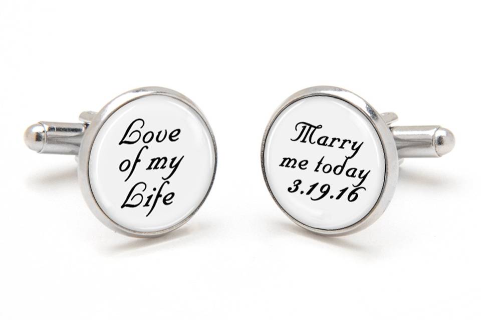 Groom Cufflinks printed with the sentimental message, Love of my Life, Marry me today, with wedding date.  Laser printed on a white background with black font, preserved under a clear glass dome.  Available in silver, gold and antique bronze bullet-style cufflink backs.