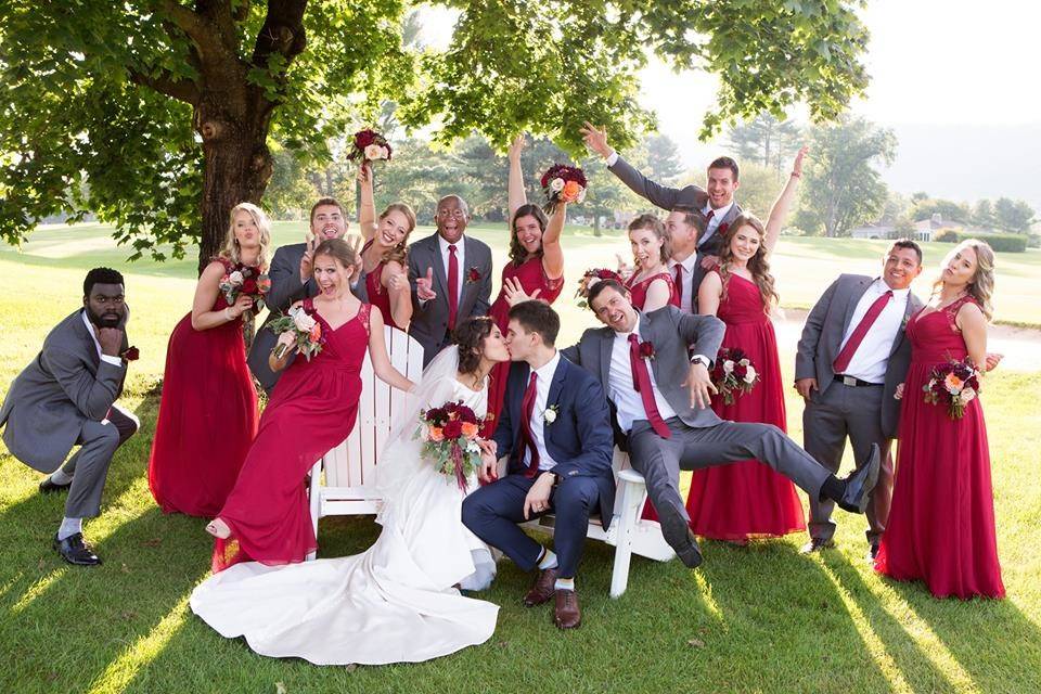 Bride and bridesmaids by the docks