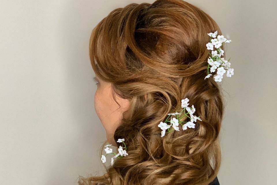 Side ponytail with flowers
