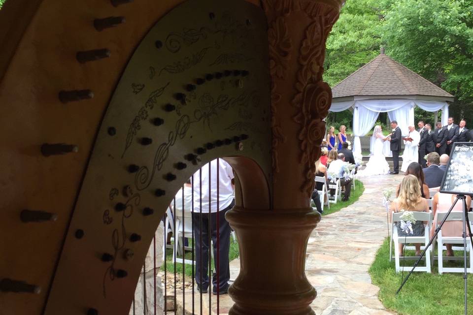 Harp setup at an outdoor wedding