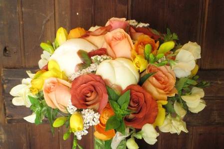 Orange, white and yellow wedding bouquet