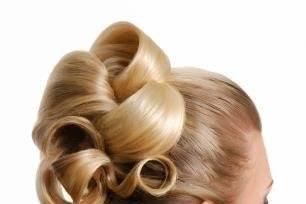 Formal bridal updo with curls.