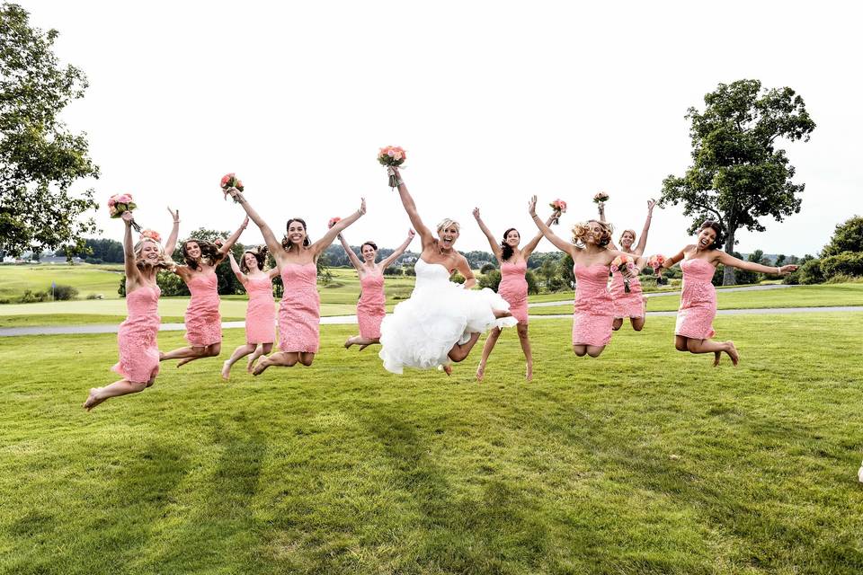 Jump shot of the bridal party