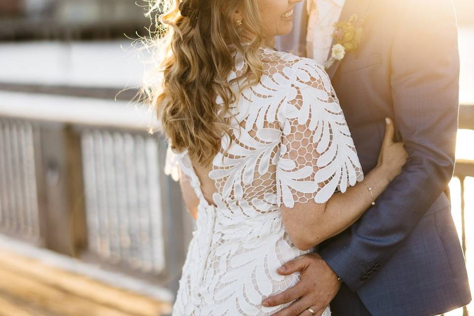 Hugging on a pier