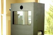 Here is the box that holds all of our photo booth magic! The touch screen operating system allows your guests to select full color or black and white photos!