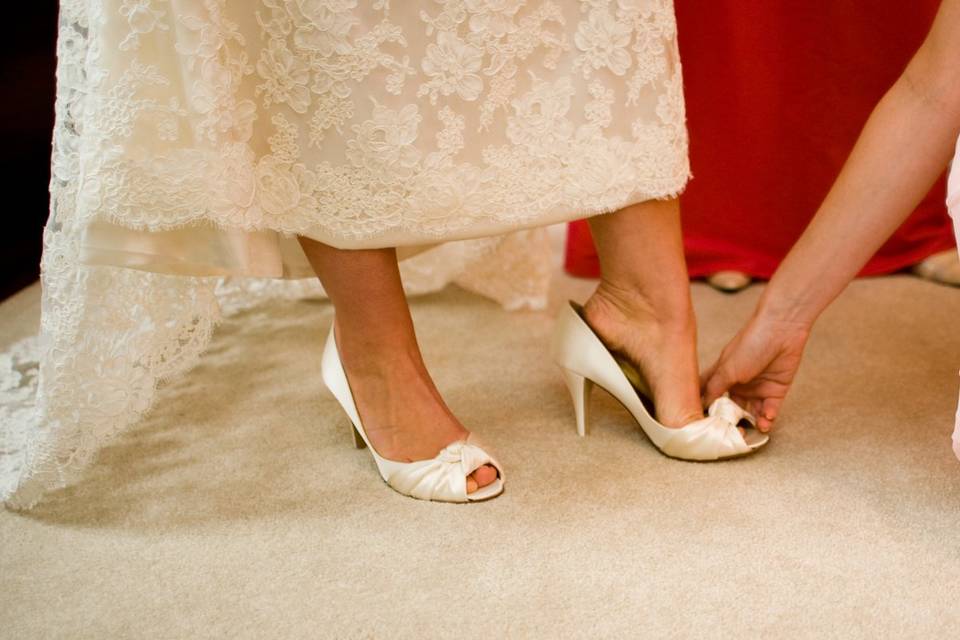 Slipping on the bridal shoes