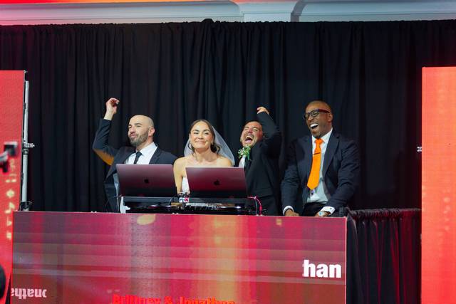 Celebrating at the DJ booth