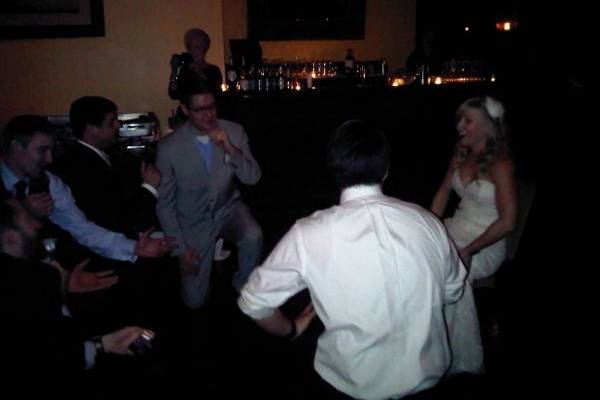 bride being serenated by all those who had the fork