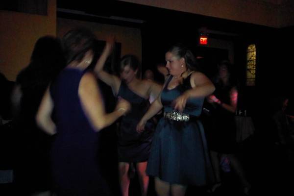 bridesmaid and maid of honor on the dance floor