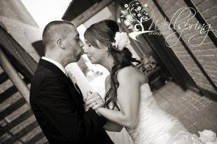 Groom kissing his bride