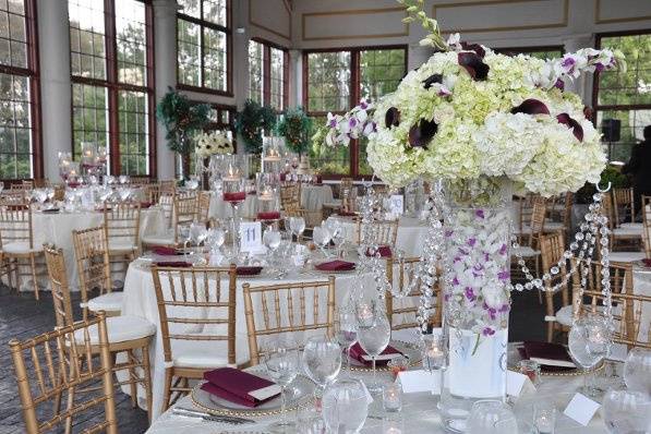 Raspberry Plain Wedding Reception with Tall Centerpieces