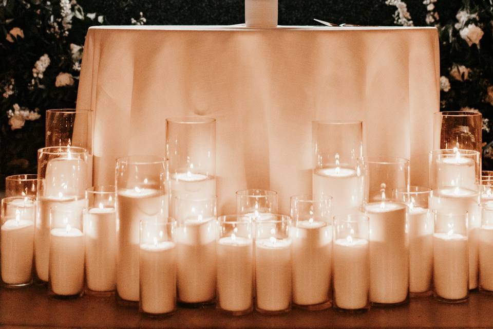 Candles around a cake table