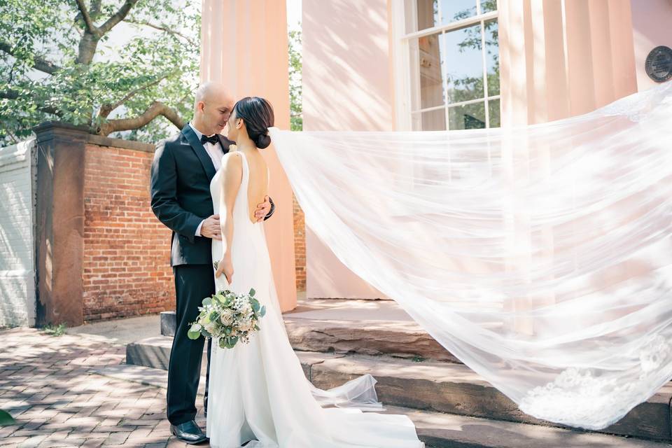 Couple and veil blowing in the wind