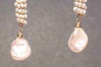 Clusters of ivory pearls, about 1-1/2