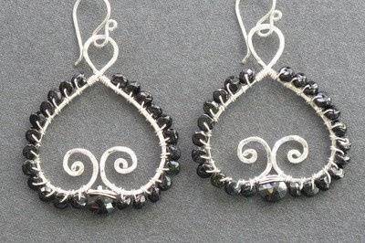 Hammered swirly drops wrapped with black spinel, about 1-1/2