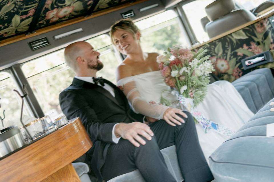 Bride groom in vintage limo