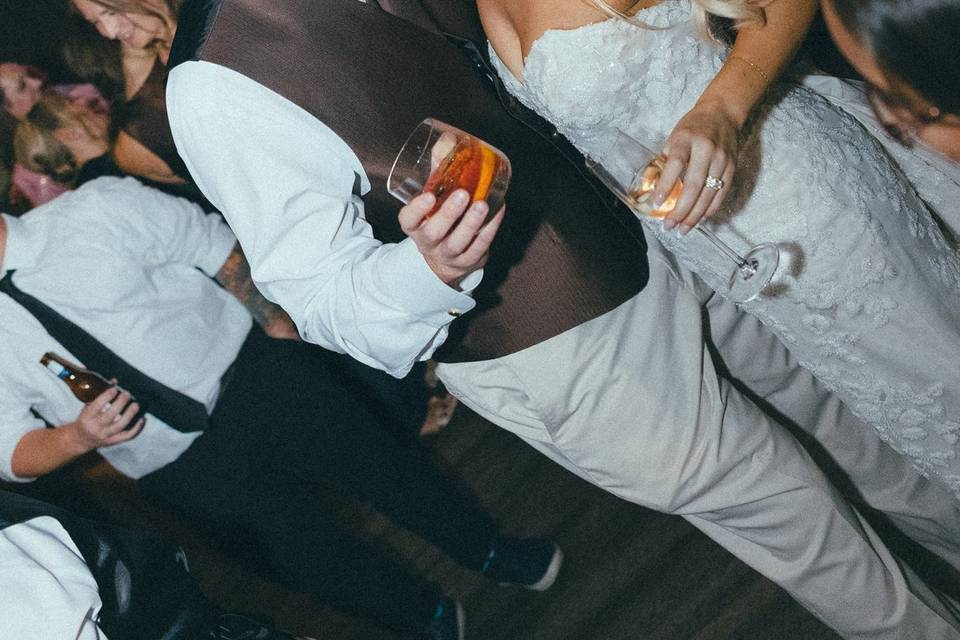 Bride groom kissing dance floo