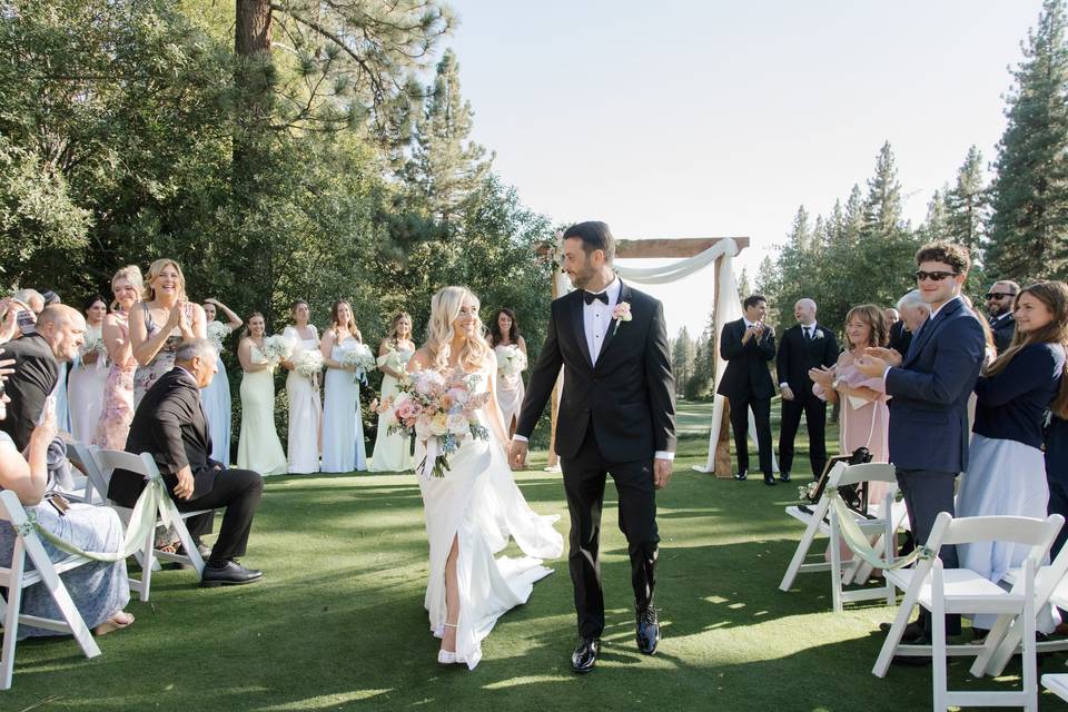 Bride groom walking down aisle