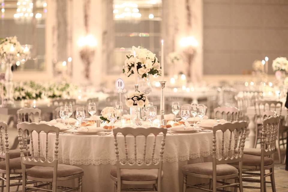 Table setting with floral and candle centerpiece