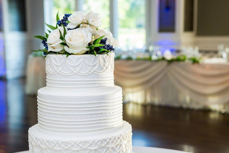 Table setting with tall floral centerpiece