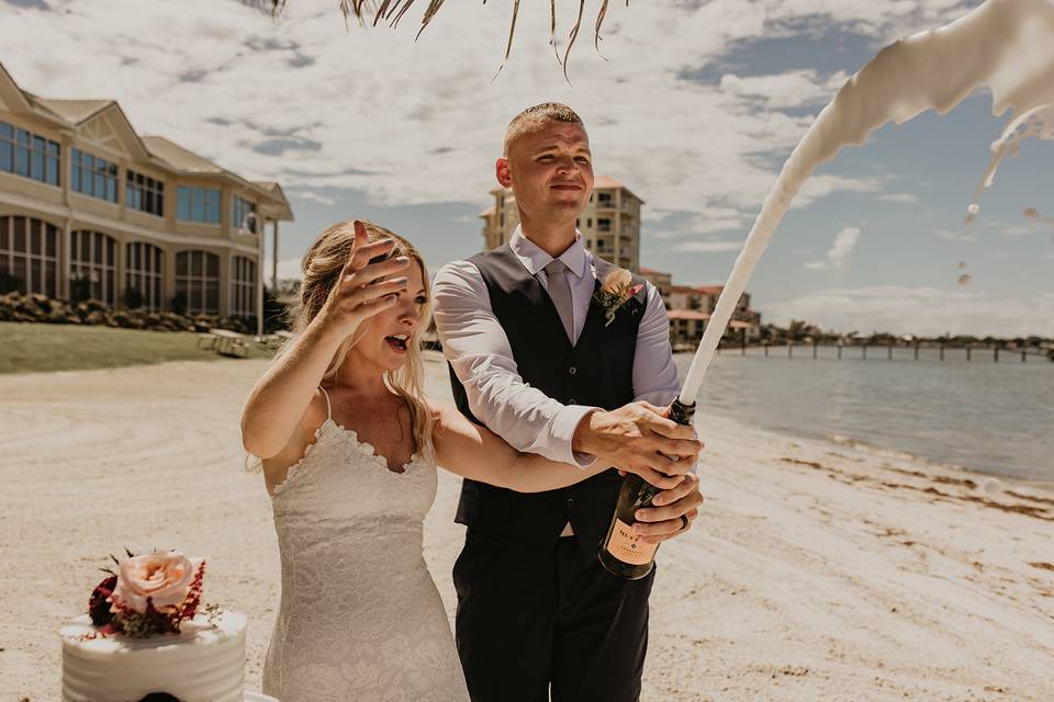 Couple Popping Champagne