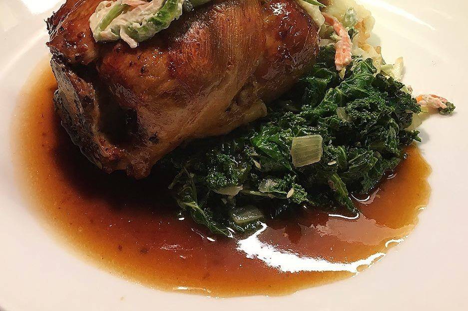 Pork Osso Bucco with Braised Greens, Cody's Creamy Mashed Potatoes, Brussel Sprout Apple and Bacon Slaw with a touch of Demi-Glace