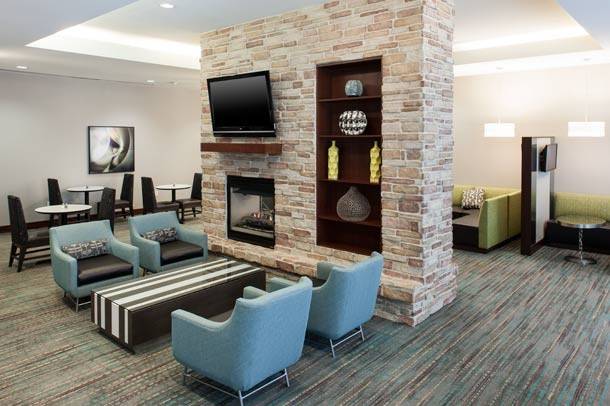 Carpeted floor with blue couche