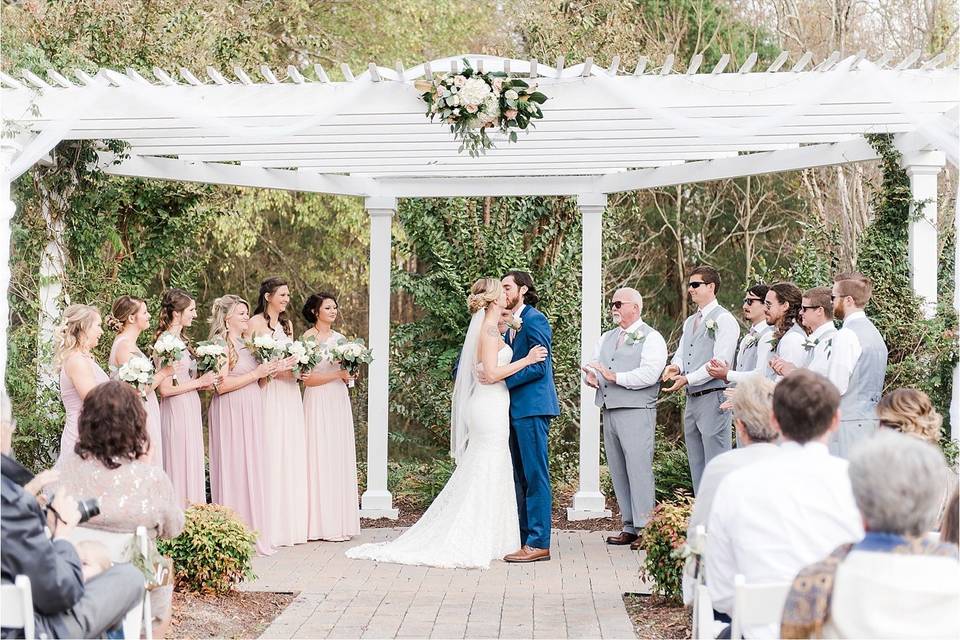 Newlyweds walking down the isle