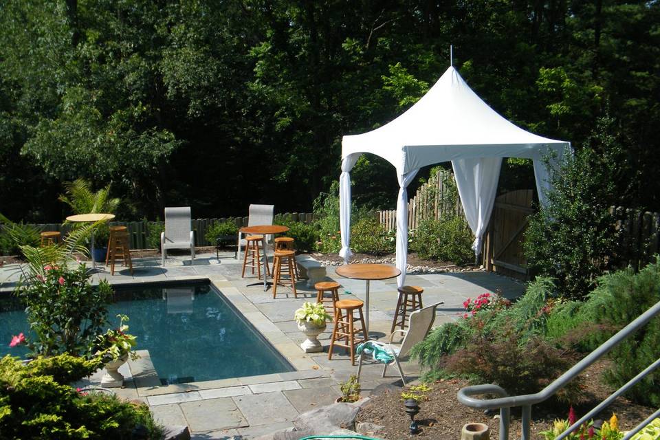 CENTURY FRAME TENT - used as a bar tent for this application shown with leg skirts