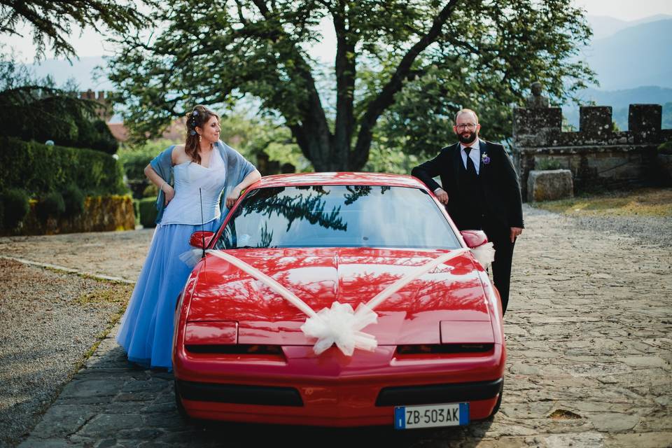 Two spouses and a car