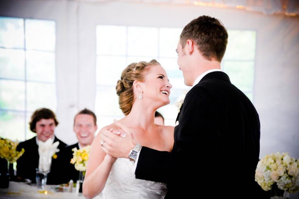 Groom carrying his bride