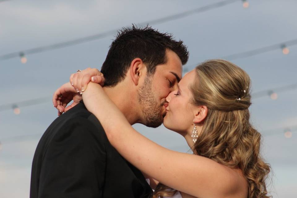 Newlyweds kissing