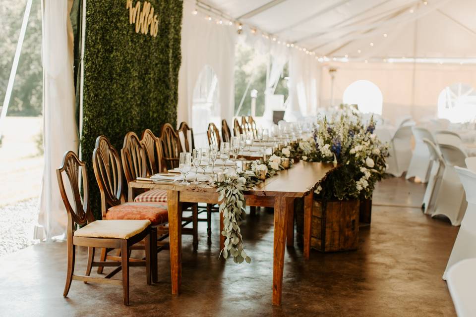 Farm tables and antique chairs