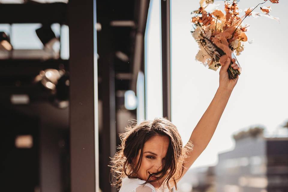 Happy downtown bride