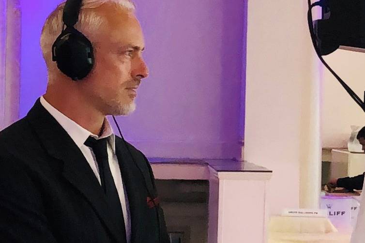 Greg in the zone, sharp suit