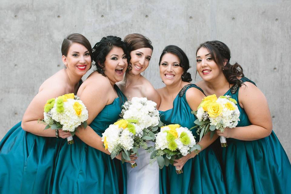 Bride and bridesmaids with wedding bouquets