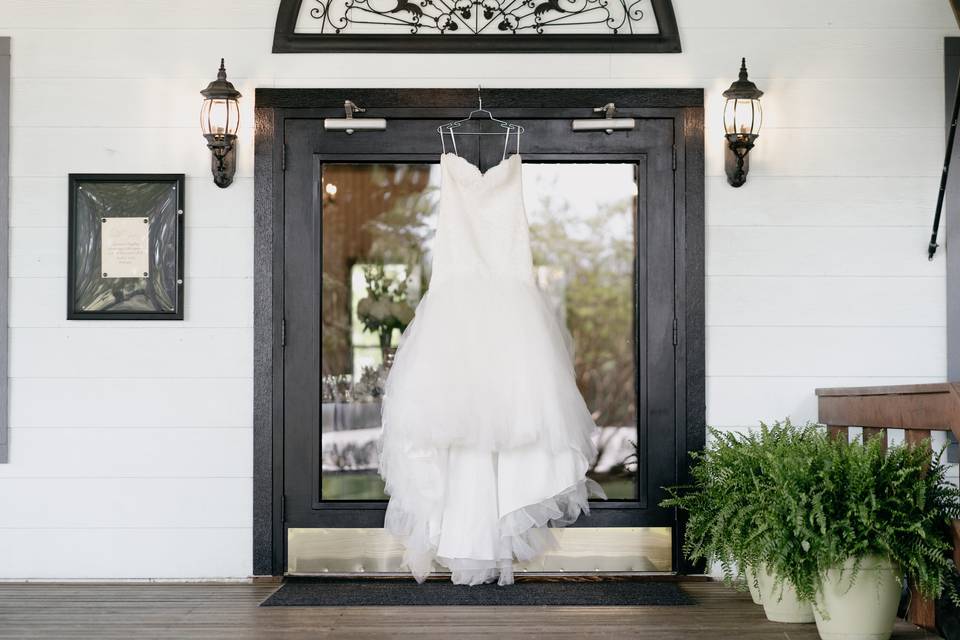Wedding gown waiting by the door