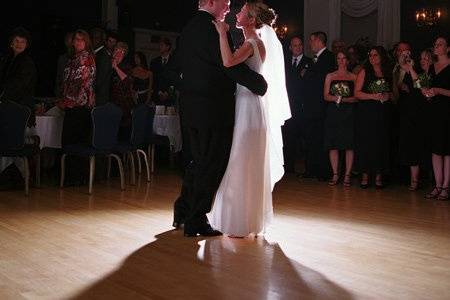 The ballroom is anchored by a stunning chandelier highlighting the dance floor. It makes for a beautiful and memorable first dance.