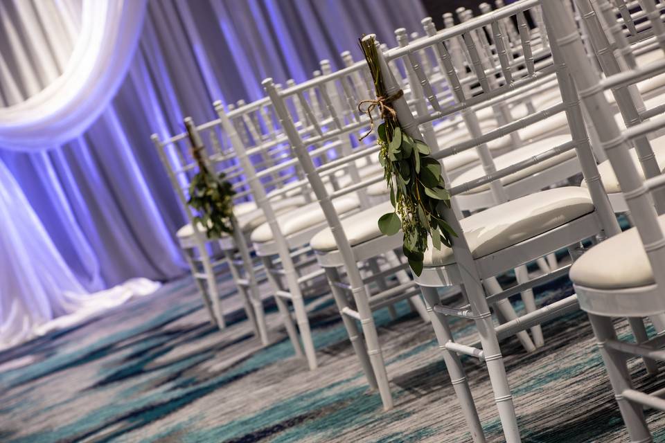 Ceremony - closeup of chairs and decor
