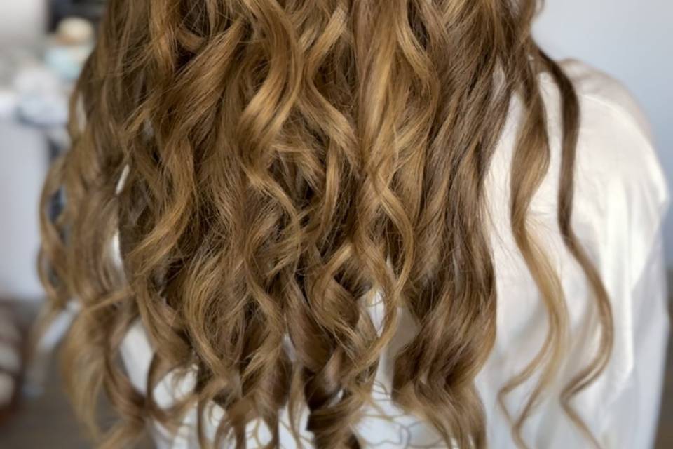 Half up textured hairstyle