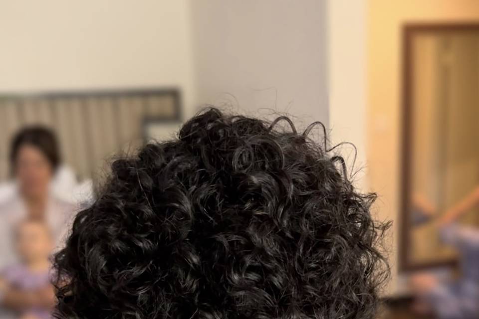 Natural curly hair bridal updo
