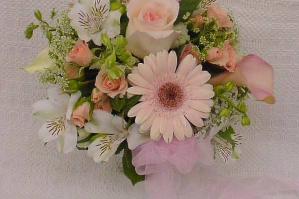 Pink & white bridesmaid bouquet of roses, gerbera, mini calla, & alstromera
