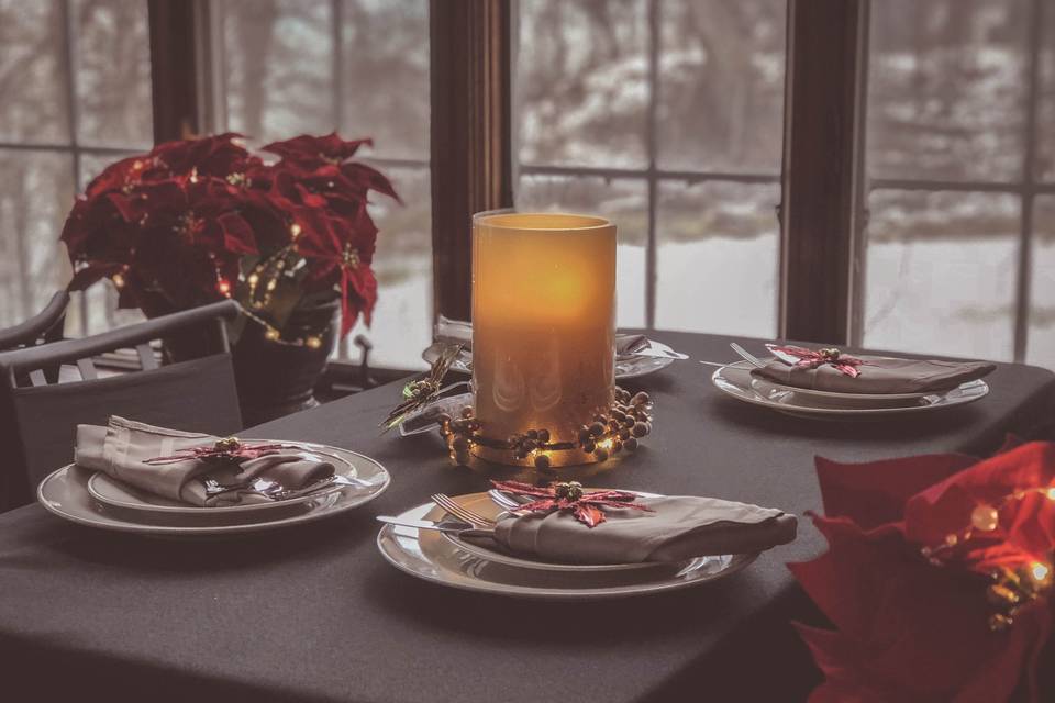 Table setting and candle centerpiece