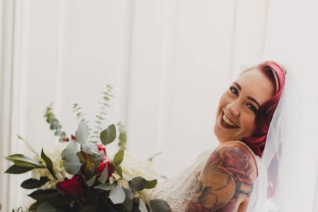 Happy bride with bouquet