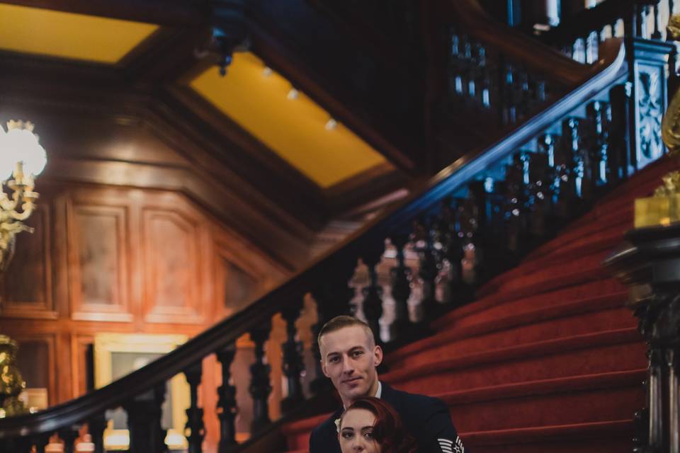 Couple posing on stairs
