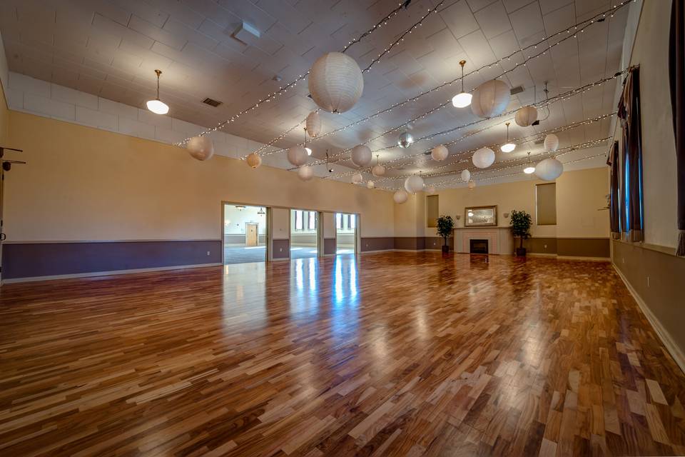With the Ballroom’s high ceilings, shimmering lights, hardwood floor, and neutral palette, it provides the perfect setting for weddings and other events.  Its 1800 SF offers ample room for a wedding ceremony, smaller event, or a night of dancing.