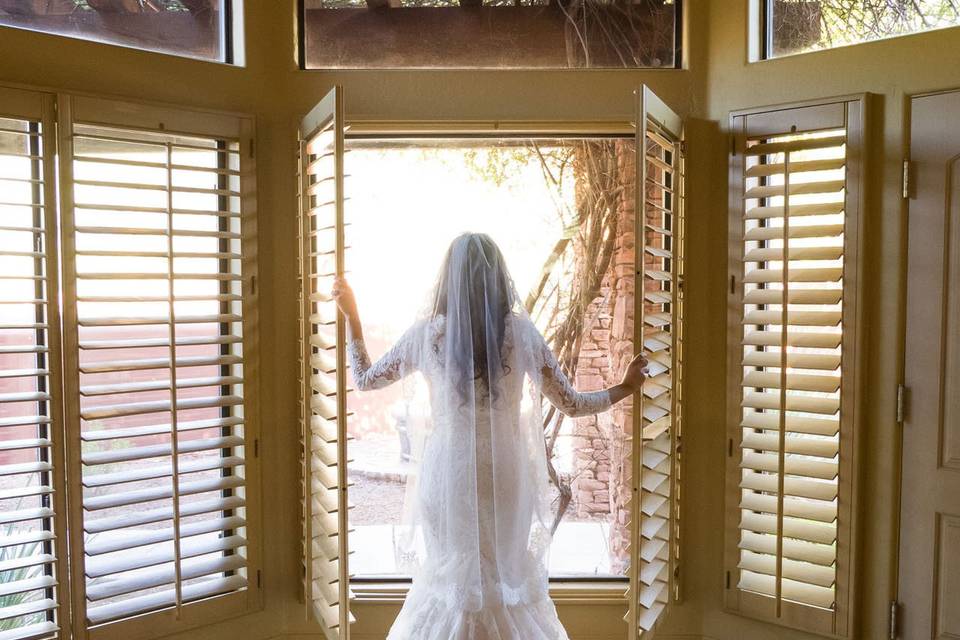Bride opening windows