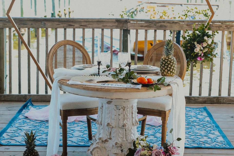 Sweetheart table and arch