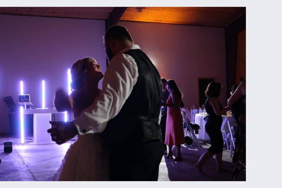 Couples dance with guests