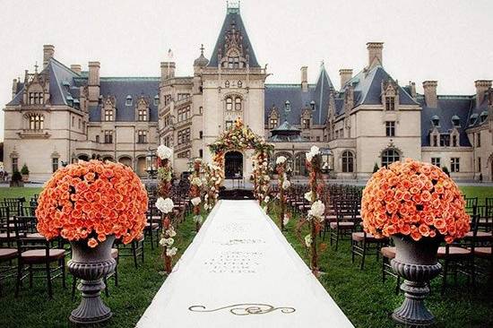 Wedding on the lawn of the historic Biltmore House by Woodward + Rick Photographers.